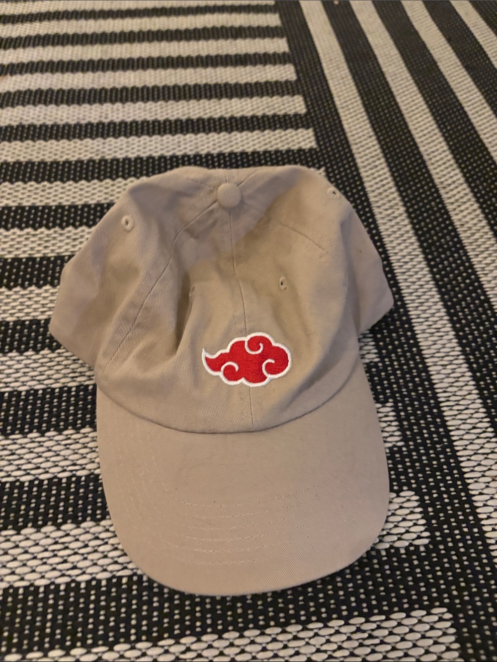 Beige Baseball Cap with Red Cloud Patch